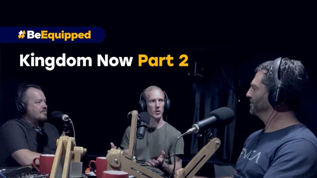 Three speakers wearing headphones around microphones in a recording studio with title 'Kingdom Now Part 2'