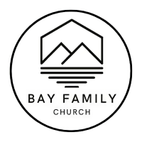 Circular black-and-white Bay Family Church logo featuring stylised mountains above water and the church name