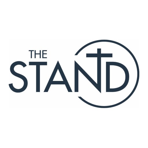 Logo for The Stand showing the words 'THE STAND' with a circular emblem incorporating a cross