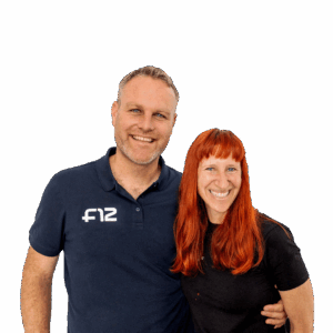 Smiling portrait of Ryan & Lelani Kingsley standing close together