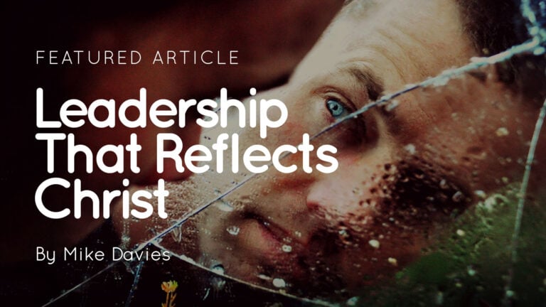 Man's face reflected in cracked wet glass with overlay text 'Leadership That Reflects Christ' by Mike Davies