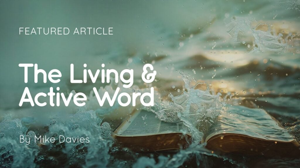 Open Bible lying in splashing water with overlay text 'The Living & Active Word' and 'By Mike Davies'
