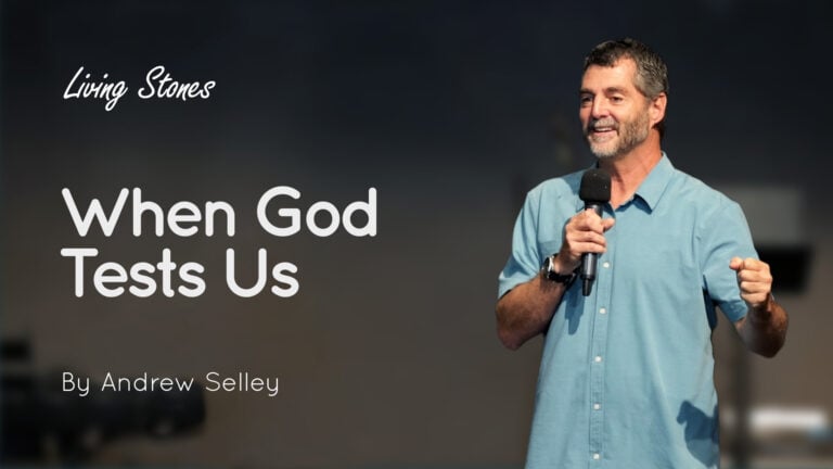 Man on stage holding a microphone with the text “When God Tests Us” and “By Andrew Selley” visible