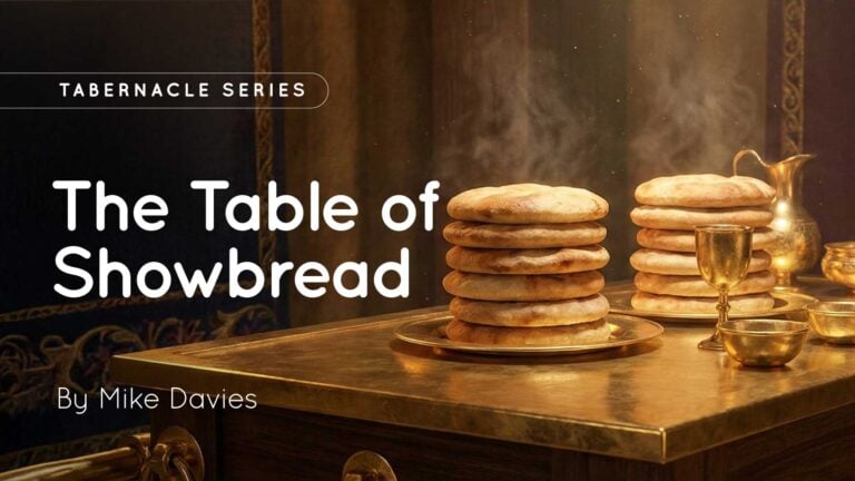 Golden table holding stacks of round showbread loaves on plates with goblets and jugs, wisps of steam rising