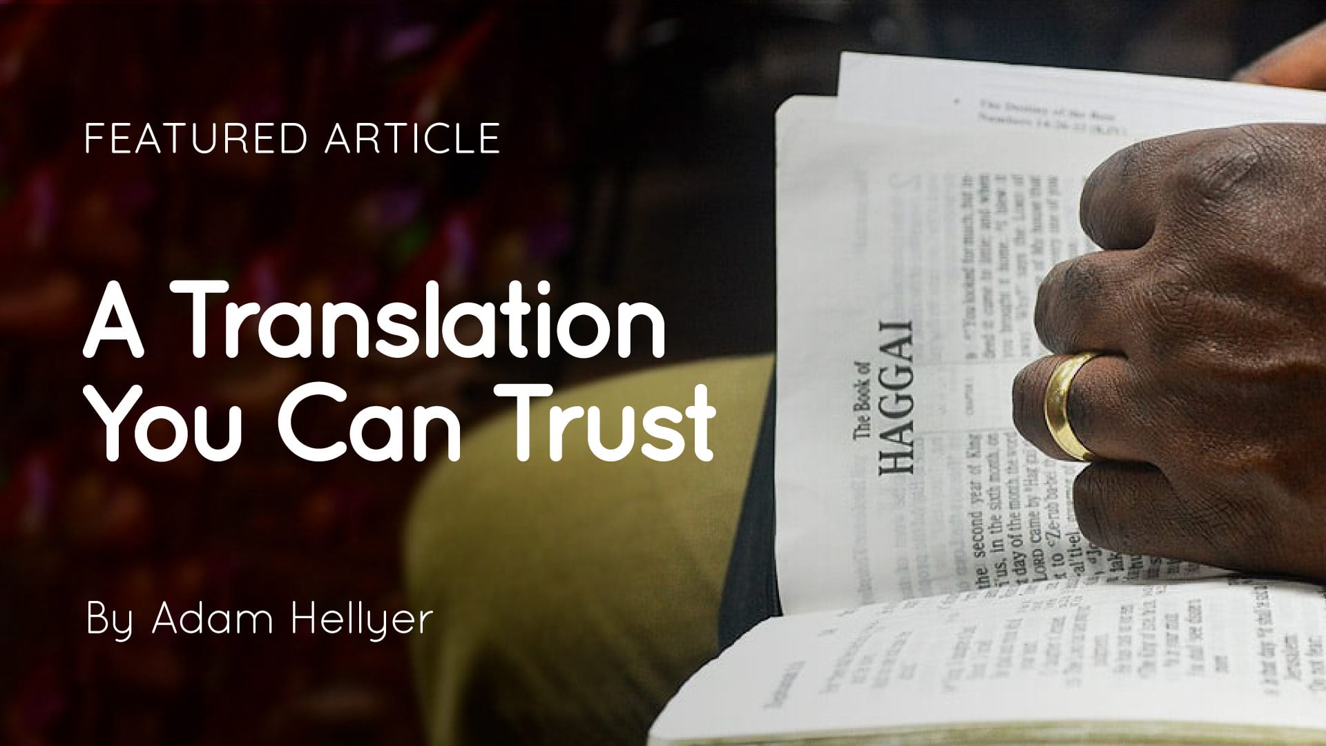 Close-up of a dark-skinned hand wearing a ring holding an open Bible to the book of Haggai, with article title overlay