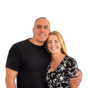 Portrait of Cliff & Keigwyn Hiscock, leaders from Joshua Generation Church, smiling and close together