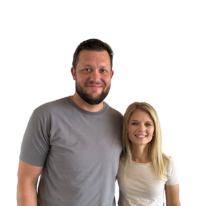 Daniel and Samantha Barnard standing side by side and smiling at the camera