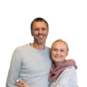 Eugene and Jessica Marais, regional coordinators, smiling and embracing