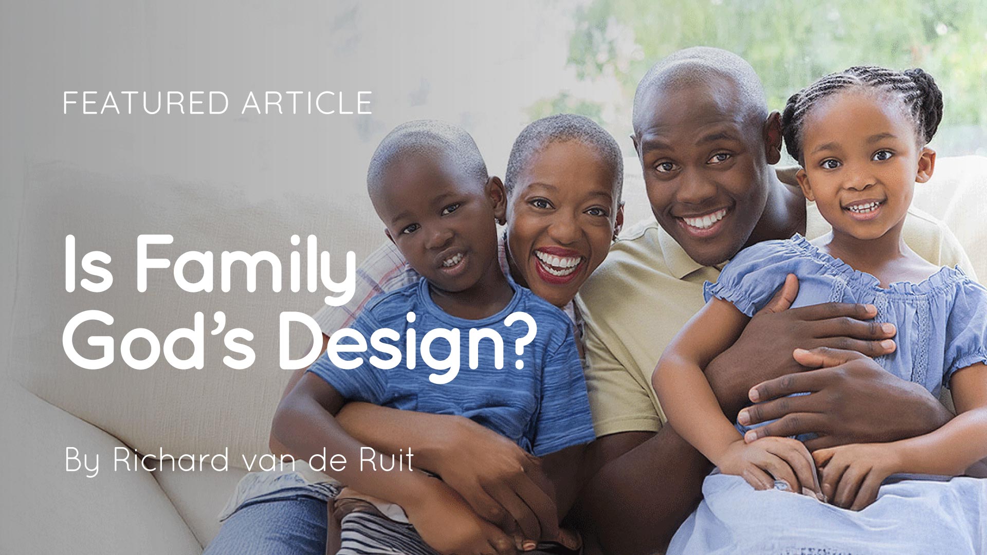 Smiling family of two adults and two children seated on a sofa with the title text 'Is Family God's Design?'
