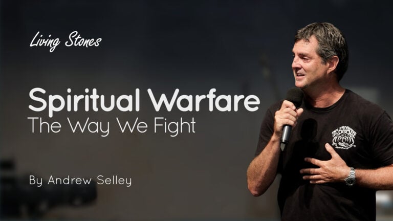 Andrew Selley speaking into a microphone beside the title ‘Spiritual Warfare: The Way We Fight’